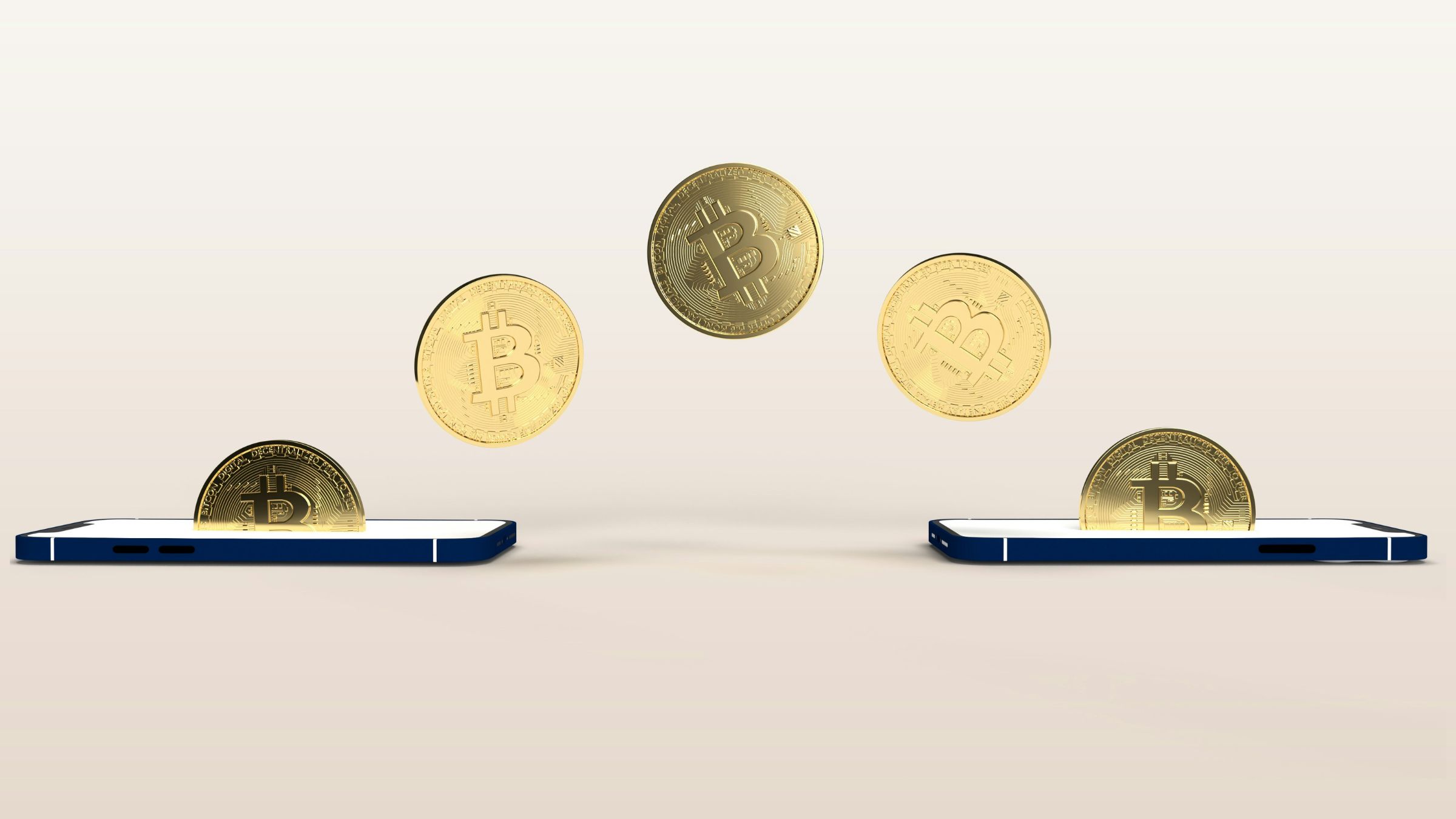Gold Bitcoin tokens appear to move between two smartphones against a plain light background.
