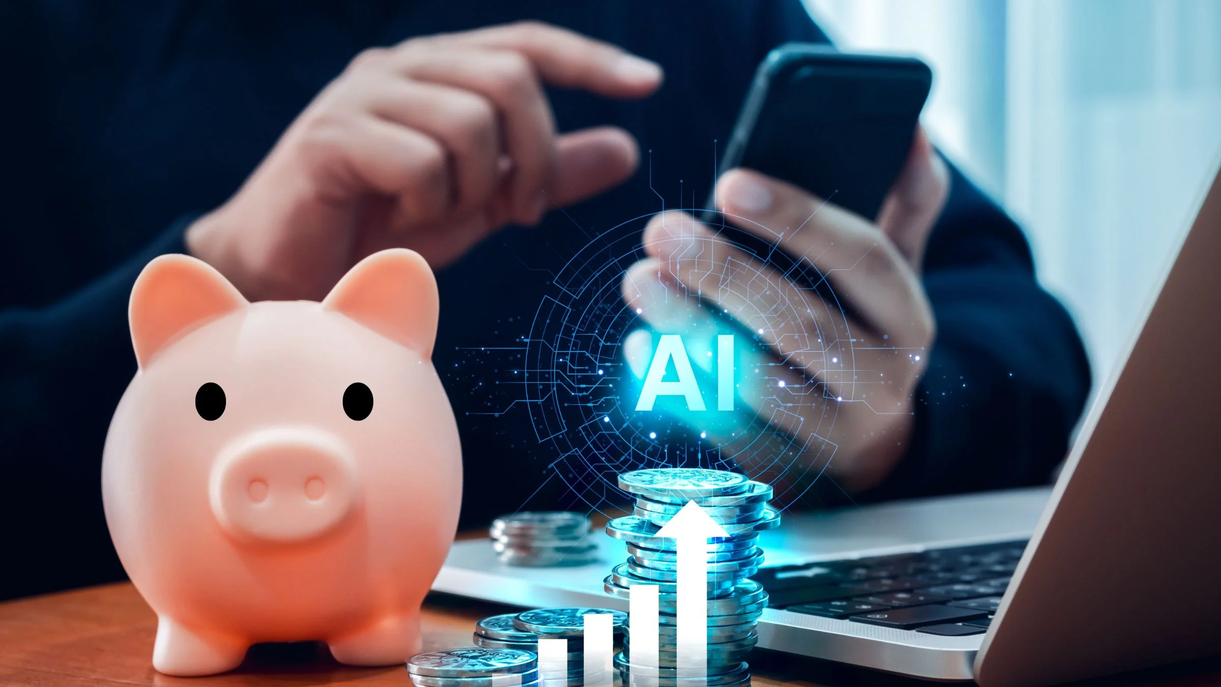 Piggy bank and coins on a desk beside a laptop, smartphone user, and glowing AI growth graphic.