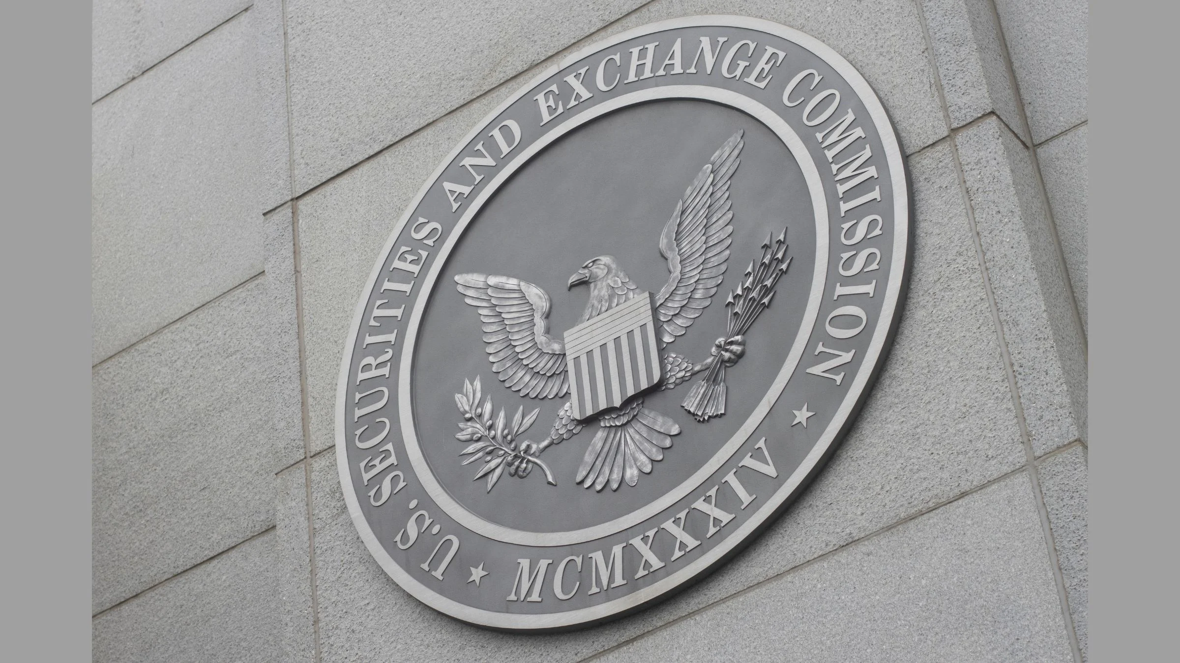 U.S. Securities and Exchange Commission seal mounted on a stone building exterior