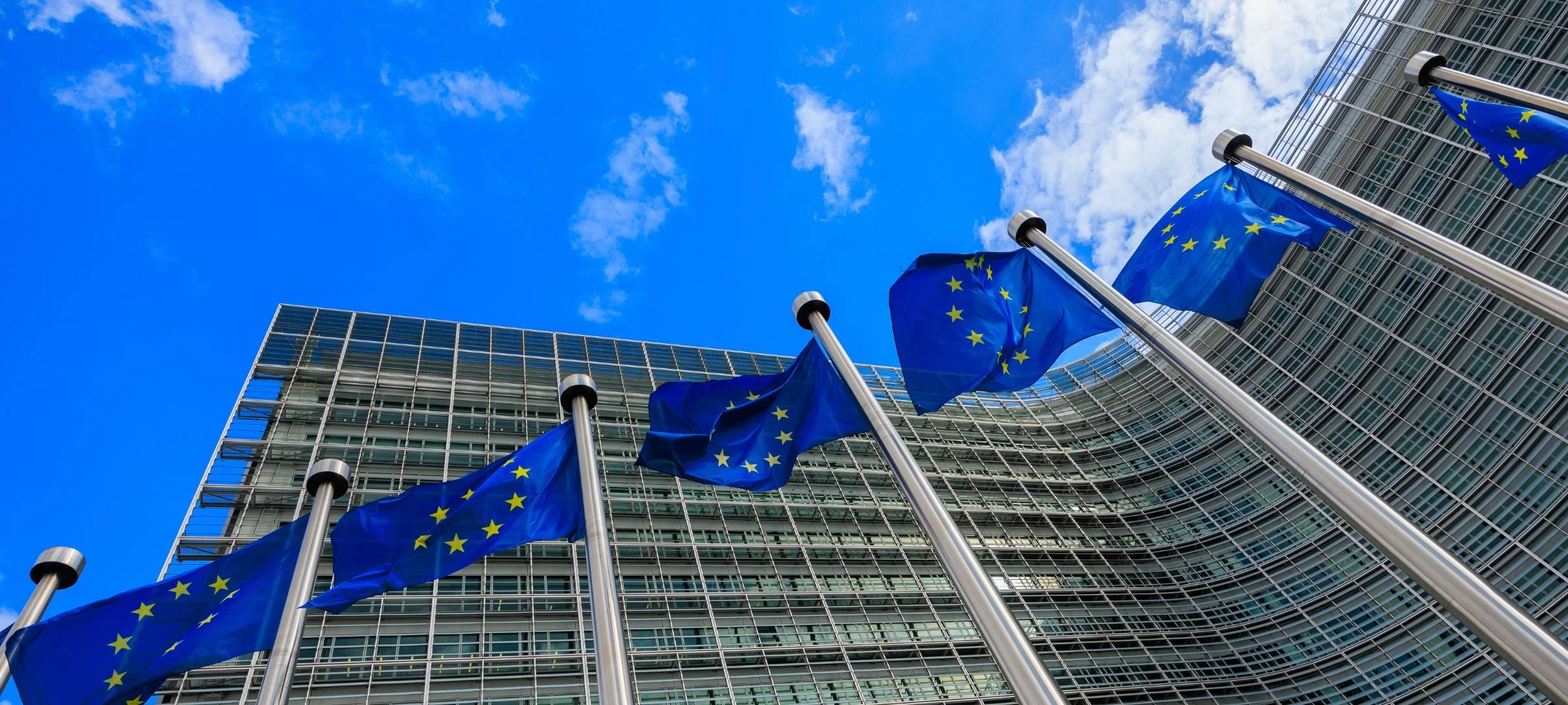 European Union flags flying outside the European Commission headquarters in Brussels