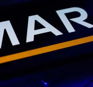 MARA Holdings brand name displayed in white with an orange line on a dark screen.